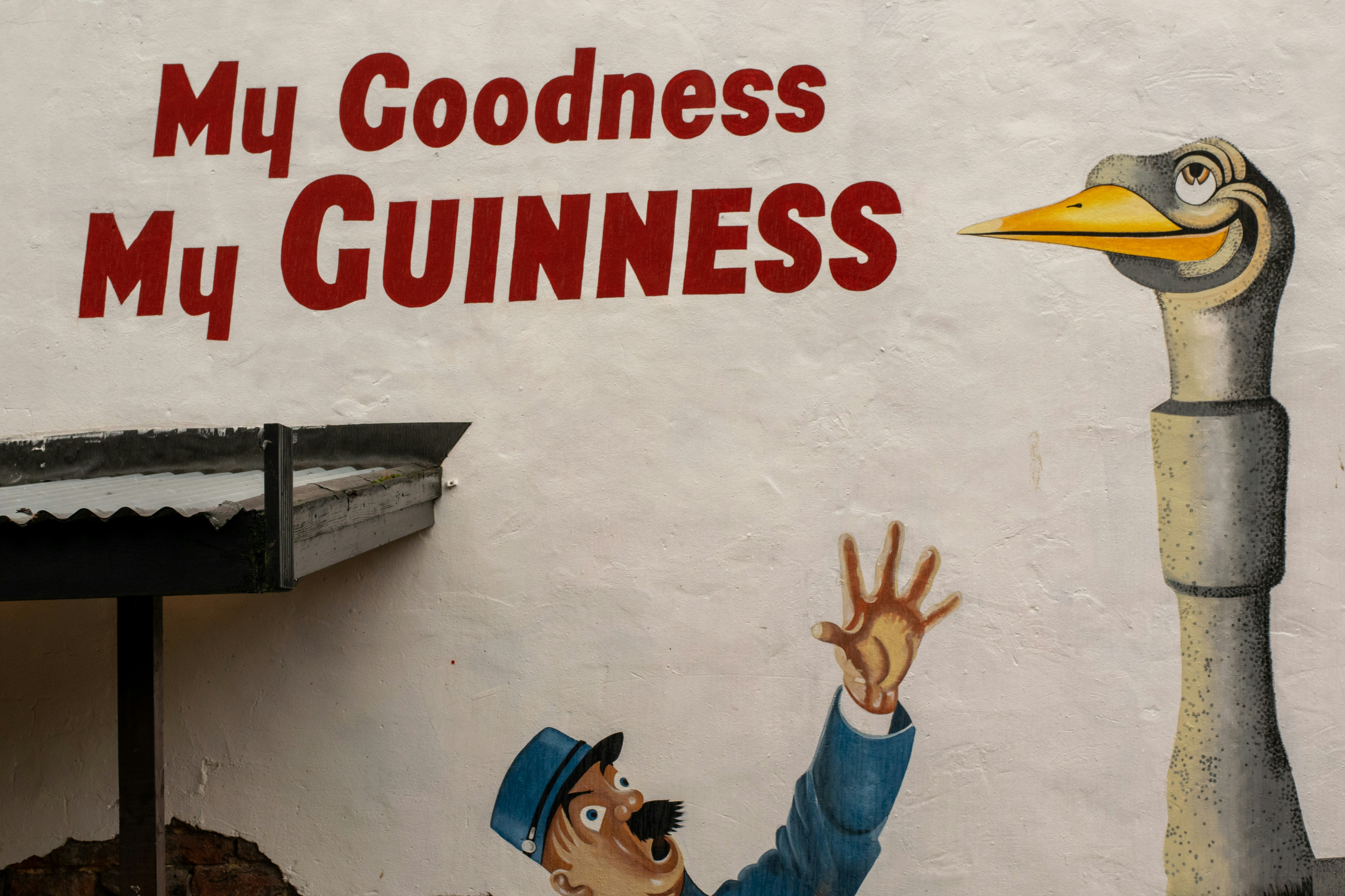 Guinness advertising on the wall of St Peter's Tavern